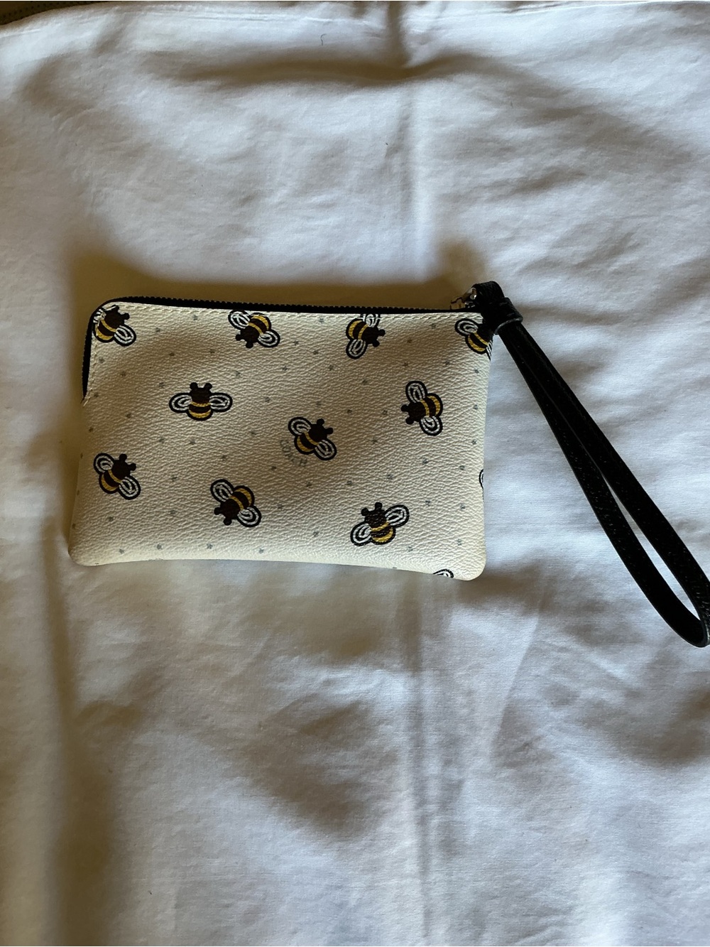 Coach Cream Bee Print Wristlet with Black Strap